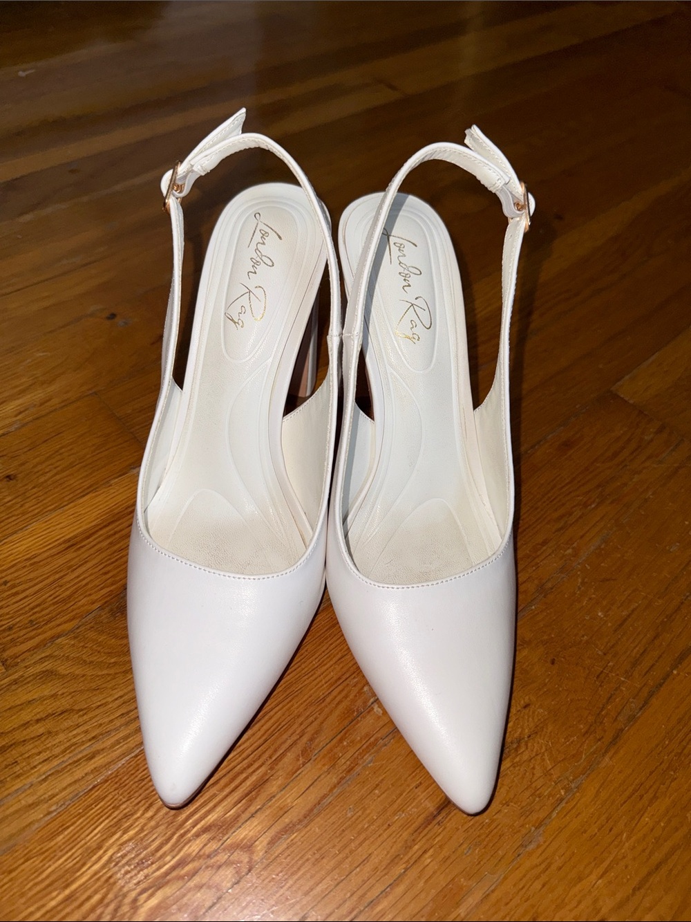 Slingback Pointed Pumps in Ivory by Andrea Rey